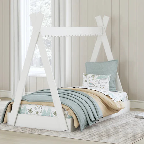 A cozy toddler bedroom with a stylish bed, plush bedding, and warm, earthy tones reflecting a southeastern U.S. aesthetic.