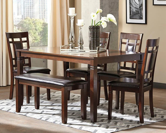 Warm and inviting dining room scene with a stylish table set, bench, chairs, and subtle southeastern U.S. style elements.