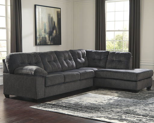 Looking for the perfect blend of decadent comfort and contemporary flair? Feast your eyes on this sensational sectional. Tufted box cushioning and thick pillow top armrests brilliantly merge style and a sumptuous feel. Wonderfully plush to the touch, the sectional’s granite gray fabric is the ultimate choice for a chic, trendy look.