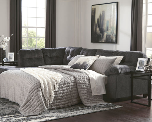 Looking for the perfect blend of decadent comfort and contemporary flair? Feast your eyes on this sectional. Tufted box cushioning and thick pillow top armrests brilliantly merge style and a sumptuous feel. Wonderfully plush to the touch, the sectional’s granite gray fabric is the ultimate choice for a chic, trendy look.