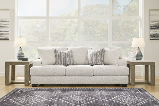 This sofa speaks to those drawn to fresh, contemporary style with richly neutral appeal. Wrapped in a wonderfully plush fabric loaded with multi-tonal interest, this on-trend piece has a warm, welcoming charm. Coordinating accent pillows add to the indulgence. Kick back, relax and settle in for comfort with this cool addition for modern spaces.