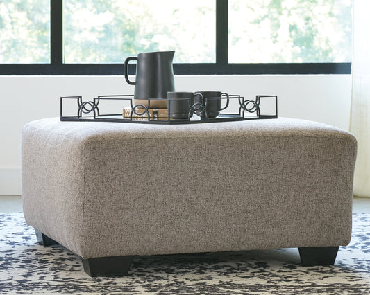 Celebrate strength and durability in design with this oversized accent ottoman. Neutral color opens doors for you to use your imagination with accessorizing the room. Softly textured chenille cushion sports stylish versatility. Throw up your feet or use it as a table for a show-stopping tray. It’s all up to you.