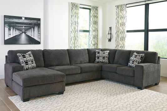 A mastery in less is more, this sectional manages to make cool, contemporary design so warm and cozy. A new twist on neutral, the sectional’s soothing "smoky" gray upholstery is incredibly plush to the touch. Gently rounded corners give the clean-lined profile a sense of ease, for a high-style look that’s ultra inviting.
