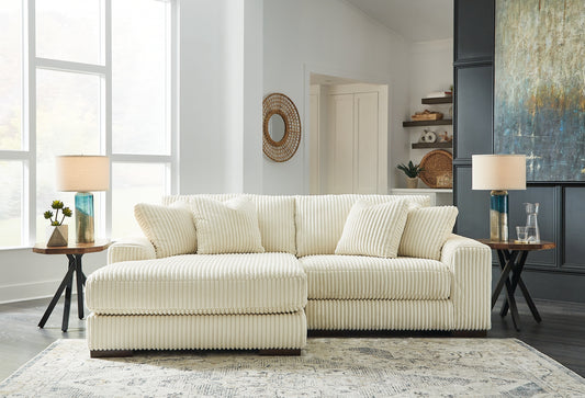 Plush and posh. Showcase your eye for on-trend texture with the statement-making cord upholstery of this sectional with chaise. Its stunningly soft fabric entices in an ivory hue, complementing contemporary color palettes. Sink into the cushions and plan to stay a while—this cozy living room centerpiece highlights your high-end approach to comfort and style.