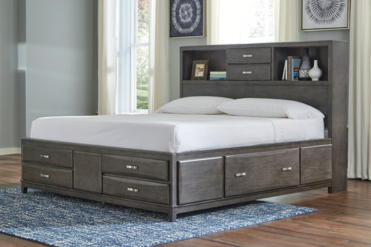 Contemporary style is shaping up beautifully. Designer elements are evident from every angle in this queen storage bed. Quality crafted with dovetail construction, contoured drawers solve small space problems with ease. On each side of the bed a deep drawer provides storage for everything from extra bedding and pillows, to seasonal clothes and more. Additional storage at the top and foot of the bed has you covered from head to toe.
