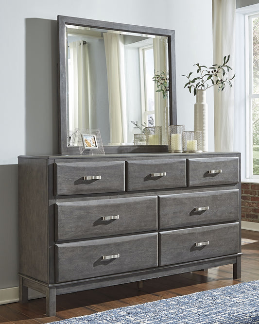 Contemporary style is shaping up beautifully. Designer elements are evident from every angle in this dresser and mirror. Quality crafted with dovetail construction, the dresser’s contoured drawers offer ample storage options. Sleek and understated, this dresser and mirror set is the epitome of casual elegance.