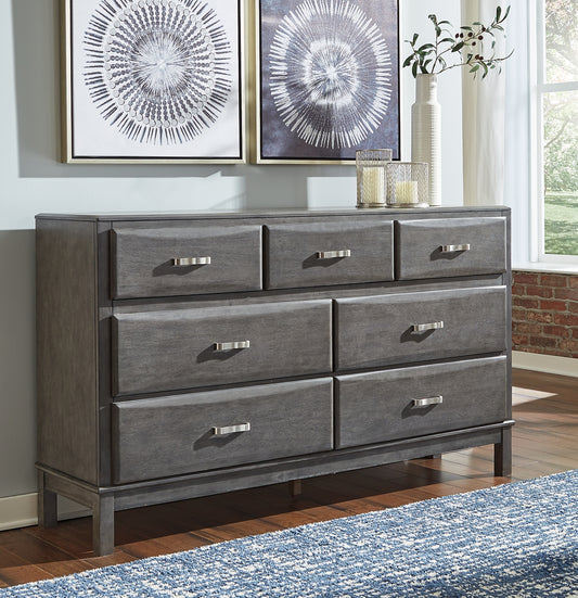 Contemporary style is shaping up beautifully. Designer elements are evident from every angle in this dresser. Quality crafted with dovetail construction, the dresser’s contoured drawers offer ample storage options. Sporting a distinctive weathered gray finish, it’s the epitome of casual elegance.
