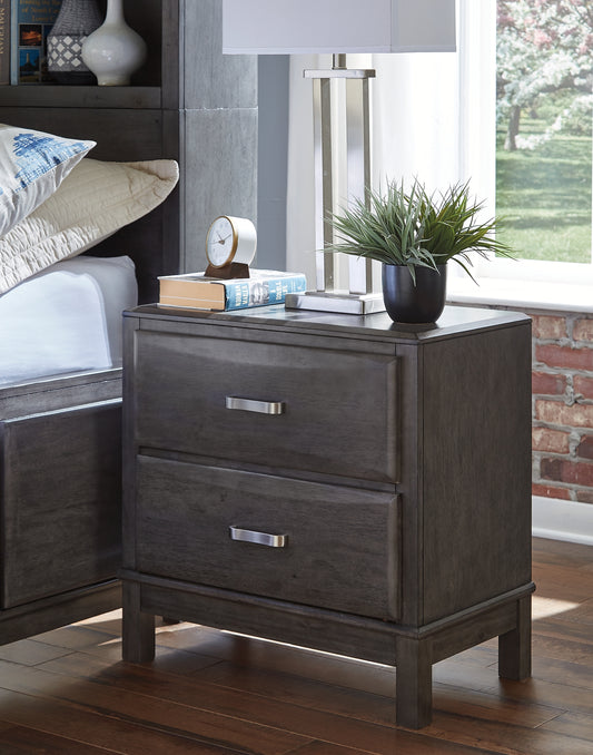 Contemporary style is shaping up beautifully. Designer elements are evident from every angle in this nightstand. Quality crafted with dovetail construction, the nightstand's contoured drawers offer endless storage options. Sporting a distinctive weathered gray finish, it’s the epitome of casual elegance.