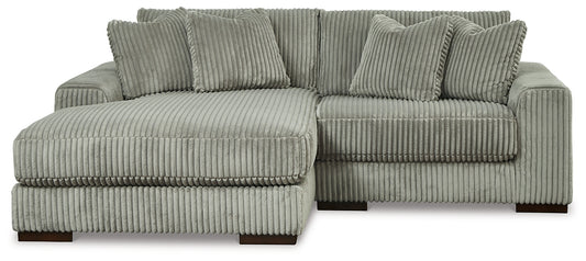 Plush and posh. Showcase your eye for on-trend texture with the statement-making cord upholstery of this sectional with chaise. Its stunningly soft fabric entices in a warm neutral hue, complementing contemporary color palettes. Sink into the cushions and plan to stay a while—this cozy living room centerpiece highlights your high-end approach to comfort and style.