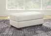 This ottoman speaks to those drawn to fresh, contemporary style with richly neutral appeal. Wrapped in a wonderfully plush fabric loaded with multi-tonal interest, the on-trend ottoman has a warm, welcoming charm. Kick back, relax and settle in for comfort with this cool addition for modern spaces.