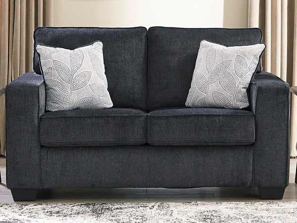 If style is the question, then this loveseat is the answer. Sporting clean lines and sleek track arms, the decidedly contemporary profile is enhanced with plump cushioning and a chenille-feel upholstery, so pleasing to the touch. Sure to play well with so many color schemes, this loveseat in slate gray includes a pair of understated floral pattern pillows for fashionably fresh appeal.
